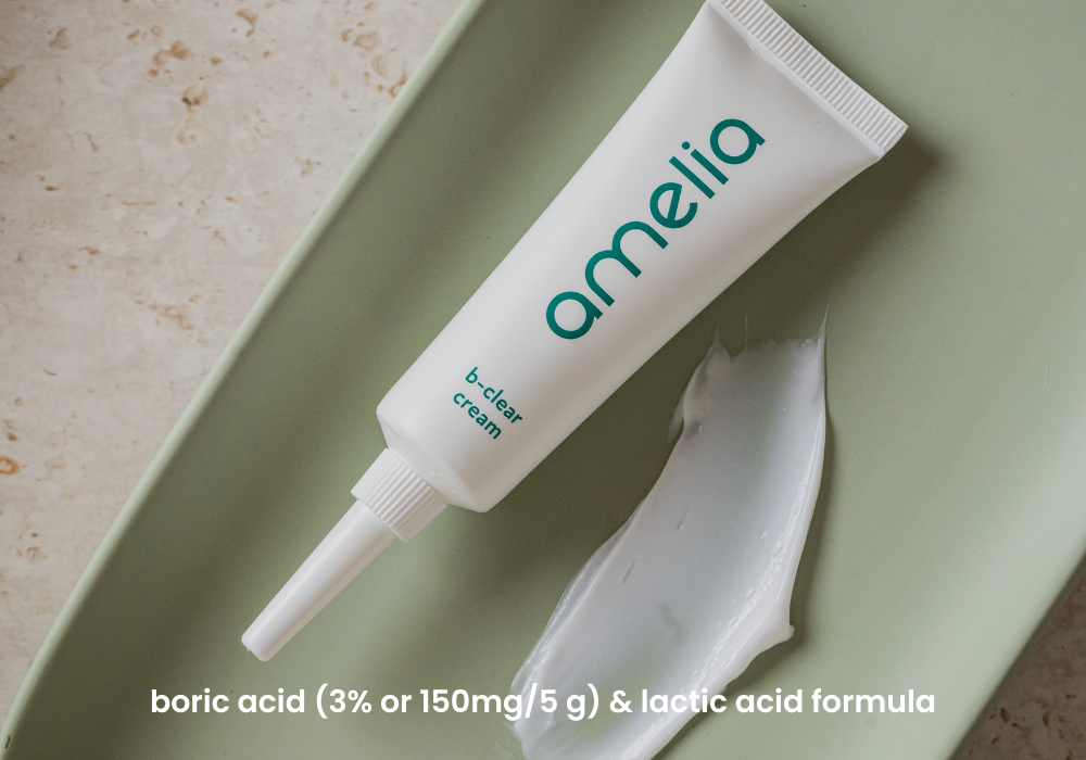 Tube of 'amelia' b-clear cream on a light green background